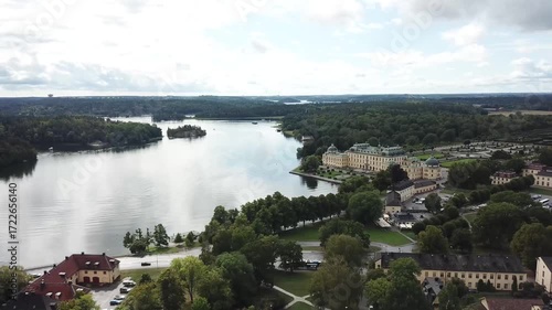 Drottningholm Palace aerial drone view, Stockholm Sweden, UNESCO World Heritage site with lake reflection, baroque architecture and scenic summer landscape
