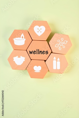 Holistic wellness concept. The eight dimensions of wellness using wooden blocks with icons; occupational, spiritual, financial, social, intellectual, environmental, emotional, and physical health.