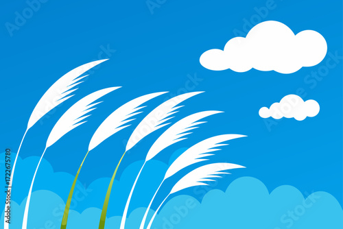 tall  white grass plumes sway against a vibrant bl