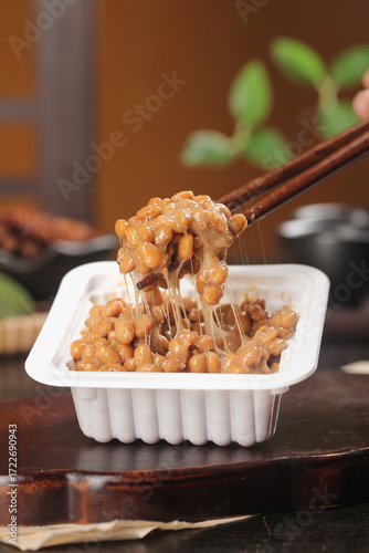 Japanese Natto Fermented Soybeans in White Container with Chopsticks - Traditional Healthy Food