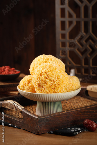 Snow Fungus Silver Ear Mushroom Traditional Chinese Medicine Ingredient in Ceramic Bowl