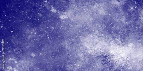 A textured surface with a predominantly purple color scheme, The texture appears rough and weathered, with lighter and darker patches, and a few small dark spots scattered across the surface.