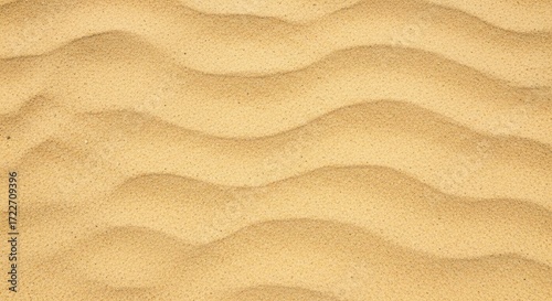 Fototapeta Naklejka Na Ścianę i Meble -  Sand dunes with wavy patterns on a beach.