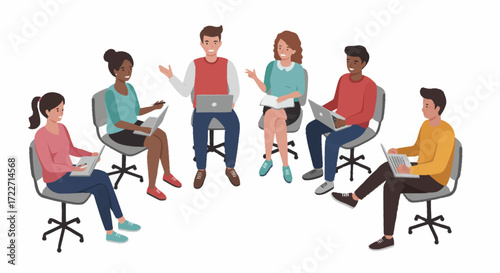 A diverse group of people sitting in a circle, working on laptops, and engaged in discussion.