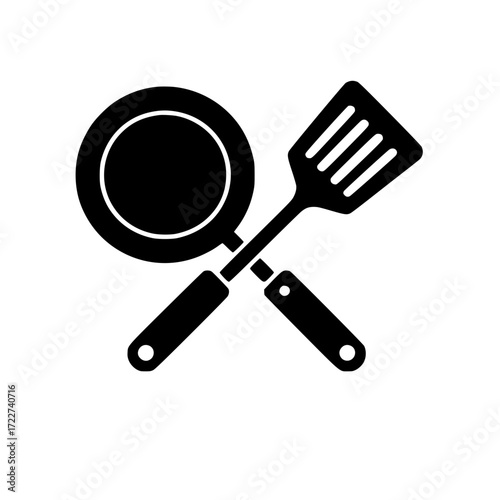 Minimalistic black silhouette of frying pan and slotted spatula crossed