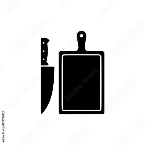 Black silhouette of kitchen knife and cutting board