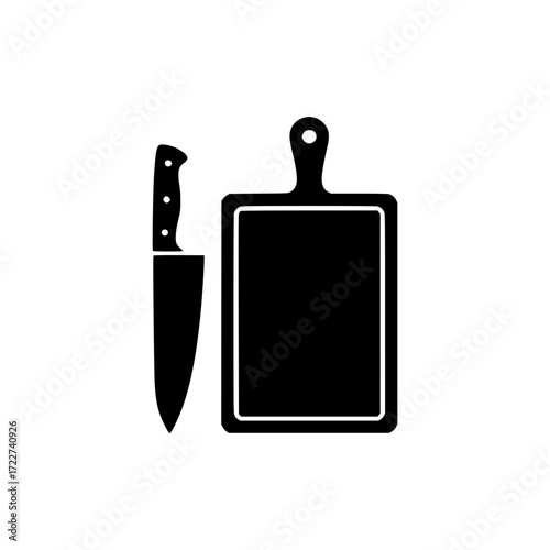 Black silhouette of kitchen knife and cutting board