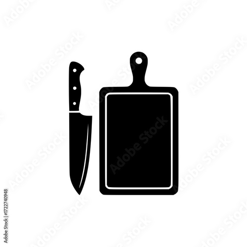Black silhouette of kitchen knife and cutting board