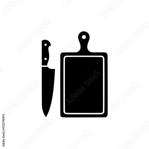 Black silhouette of kitchen knife and cutting board