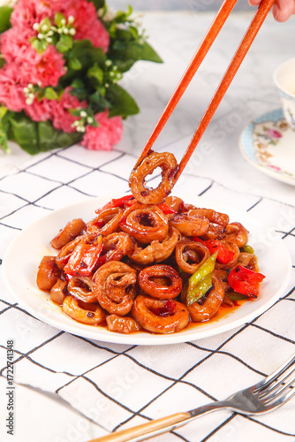 Marinated Pig Intestine Rings in Soy Sauce - Traditional Asian Cuisine Dish with Peppers