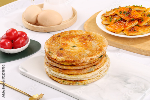 Shanghai Scallion Pancakes Stack with Traditional Chinese Food Ingredients