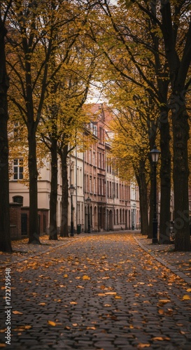 Autumn Walk in Bruges Cobblestone Street Lined with Golden Trees