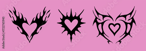 Vector illustration of three tribal heart designs in black silhouettes on a pink background. The image uses bold, jagged, abstract shapes typical of tribal tattoo style, blending love and edginess.