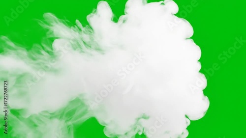 White smoke billows on green screen background, ideal for VFX, motion graphics, and compositing projects, enhancing video editing, films, and creative design work.