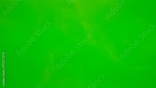 Golden mist cloud dissolving on green screen background. Perfect for VFX, video editing, compositing, cinematic transitions, motion graphics, and creative visual effects.