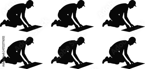 silhouette worker kneeling installing floor tiles symbolizing construction labor, home renovation, interior finishing, craftsmanship, ceramic tile laying, flooring installation, remodeling