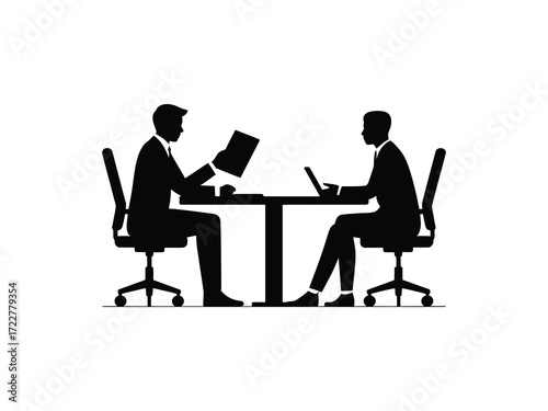 Business meeting silhouette of two men at a table