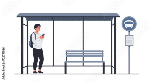 A young man engrossed in his smartphone while waiting for a bus at a modern bus stop, illustrating urban life, technology, and anticipation