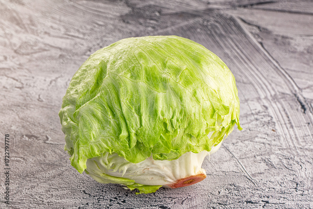 Obraz premium Raw iceberg salat over background