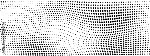 Abstract dotted halftone pattern with distressed grain effect. Monochrome stippled texture for vintage design. Pixelated dots  organic noise overlay.  Background for retro poster graphics. Vector