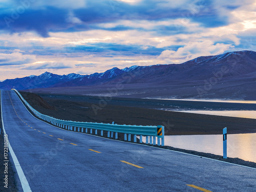 Snow capped mountains, plateau highways, and pastures in the western mountainous areas of Sichuan, China On September 30th, 2024