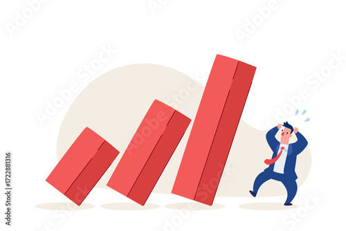 panic businessman watching falling red bar chart