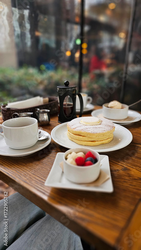 Fotografie Close-up of hot drip coffee with cream sugar pearl pancake and caramel crème brû