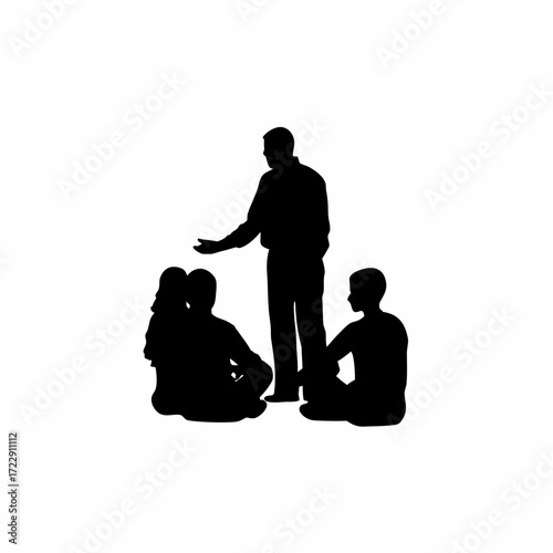 Counselor leading circle discussion with students silhouette