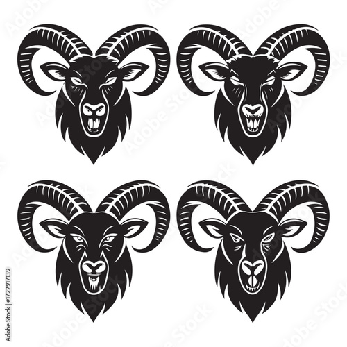 Set of Aggressive Ram or Goat Silhouettes with Horns and Fangs (2).eps