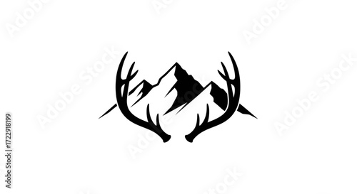 Majestic mountains framed by antler silhouette invoking the spirit of the wild and outdoors