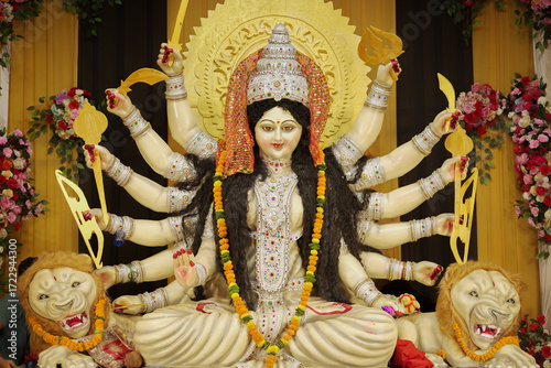Photography Goddess Durga with lion statue, Hindu goddess Durga idol, Navratri festival Durga maa, Divine Durga mata sculpture stock photo