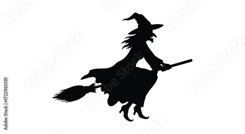 A witch flying on a broomstick with a classic halloween silhouette