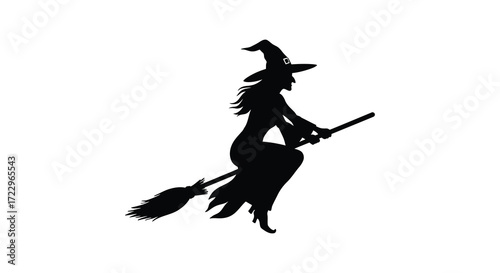 A witch on a broomstick flying through the air silhouette