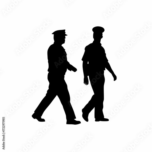 Silhouette of officer escorting parolee inside courthouse