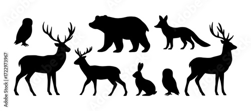 Black silhouette forest animals set - deer, bear, fox, rabbit and owl. Woodland and nature-themed vector elements. Christmas animals on white background.