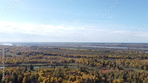 Flight over the autumn Siberian forest