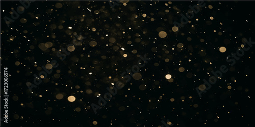 Night winter water drops on a black background with blue light like falling snowflakes and stars