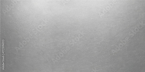 Brushed gray metal surface texture with a blank steel design for a vintage pattern backdrop