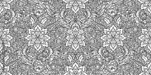 Intricate Black and White Mandala Pattern with Symmetric Geometric Design, Intricate Details and Ornate Floral Motifs