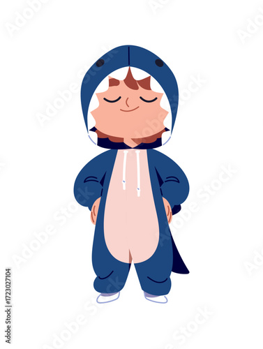 Adorable kid is wearing kigurumi, costume of shark with hood. Joyful child in funny pajama. Happy little boy is in cute onesie of animal stands. Flat isolated vector illustration on white background