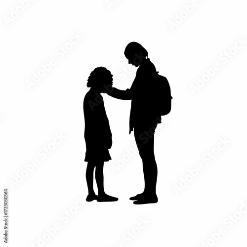 School counselor comforting student after bullying silhouette
