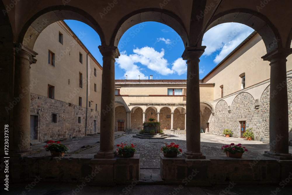 Naklejka premium Cloister of Abbazia di San Salvatore, romanesque styled medieval church in Tuscany, Italy