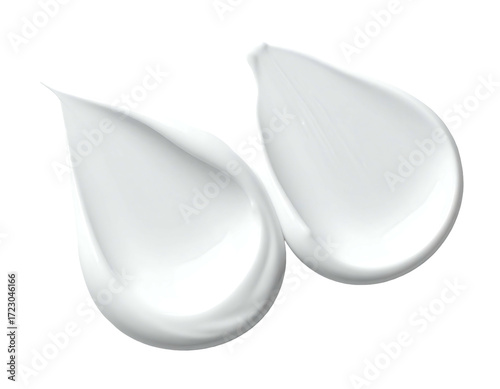 Two teardrop-shaped dollops of thick, white cream or lotion, glossy and smooth, sit side-by-side against a black background