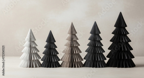 Decorative folded paper trees in a row
