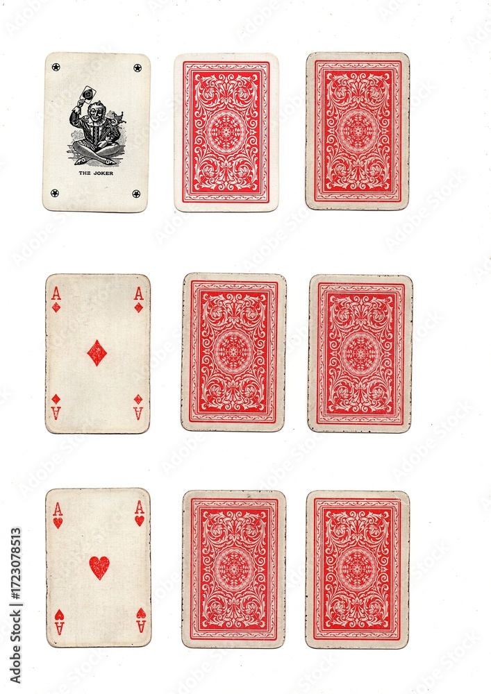 Fototapeta premium Three different hands of grubby vintage playing cards isolated on a white background.