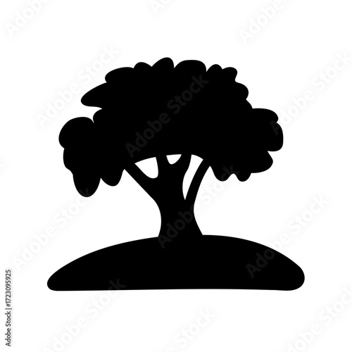 Monochrome image of a stylized tree on a small mound silhouette