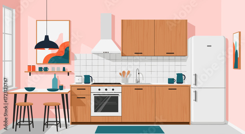 A cozy and modern kitchen with pink walls and wooden cabinets features a small dining area and a large refrigerator.