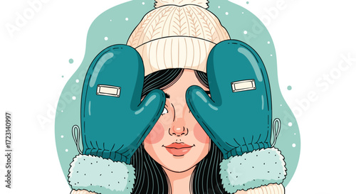 Playful girl peeking through cozy mittens, celebrating winter fun and snowy day excitement with a warm hat