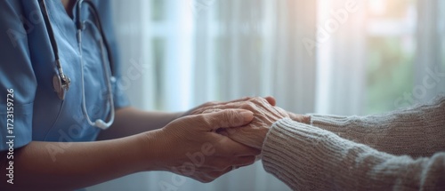 The caring hands of a nurse supporting an elderly patient in a healthcare setting