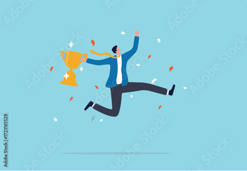 Celebrate work achievement, success or victory, winning prize or trophy, challenge or succeed in business competition concept, happy businessman holding winning trophy jumping high for celebration.